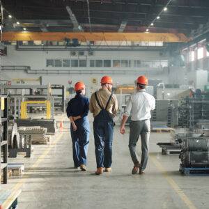 back-view-three-young-contemporary-workers-industrial-plant-walking-along-large-factory-communicating_274679-9593 back-view-three-young-contemporary-workers-industrial-plant-walking-along-large-factory-communicating_274679-9593